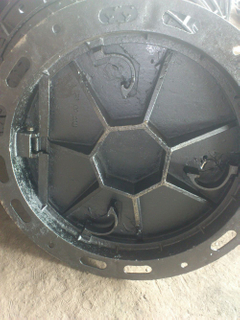 hinged manhole cover