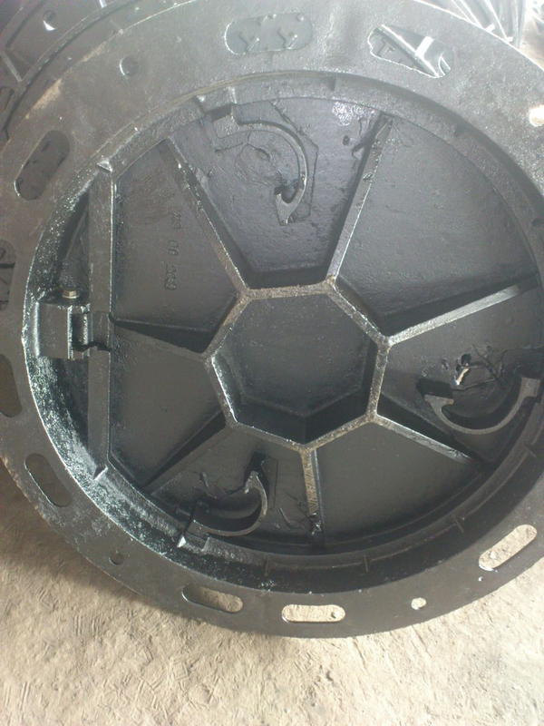 hinged manhole cover